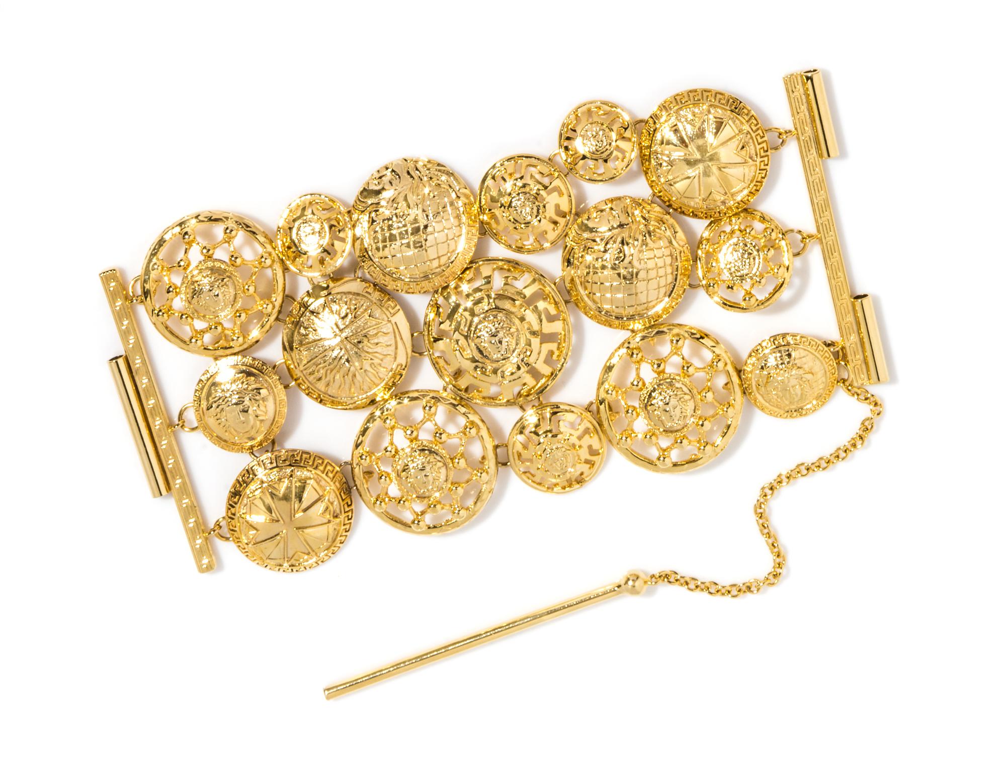A Gianni Versace Triple Strand Medallion Link Bracelet, 7" X 3.75".
