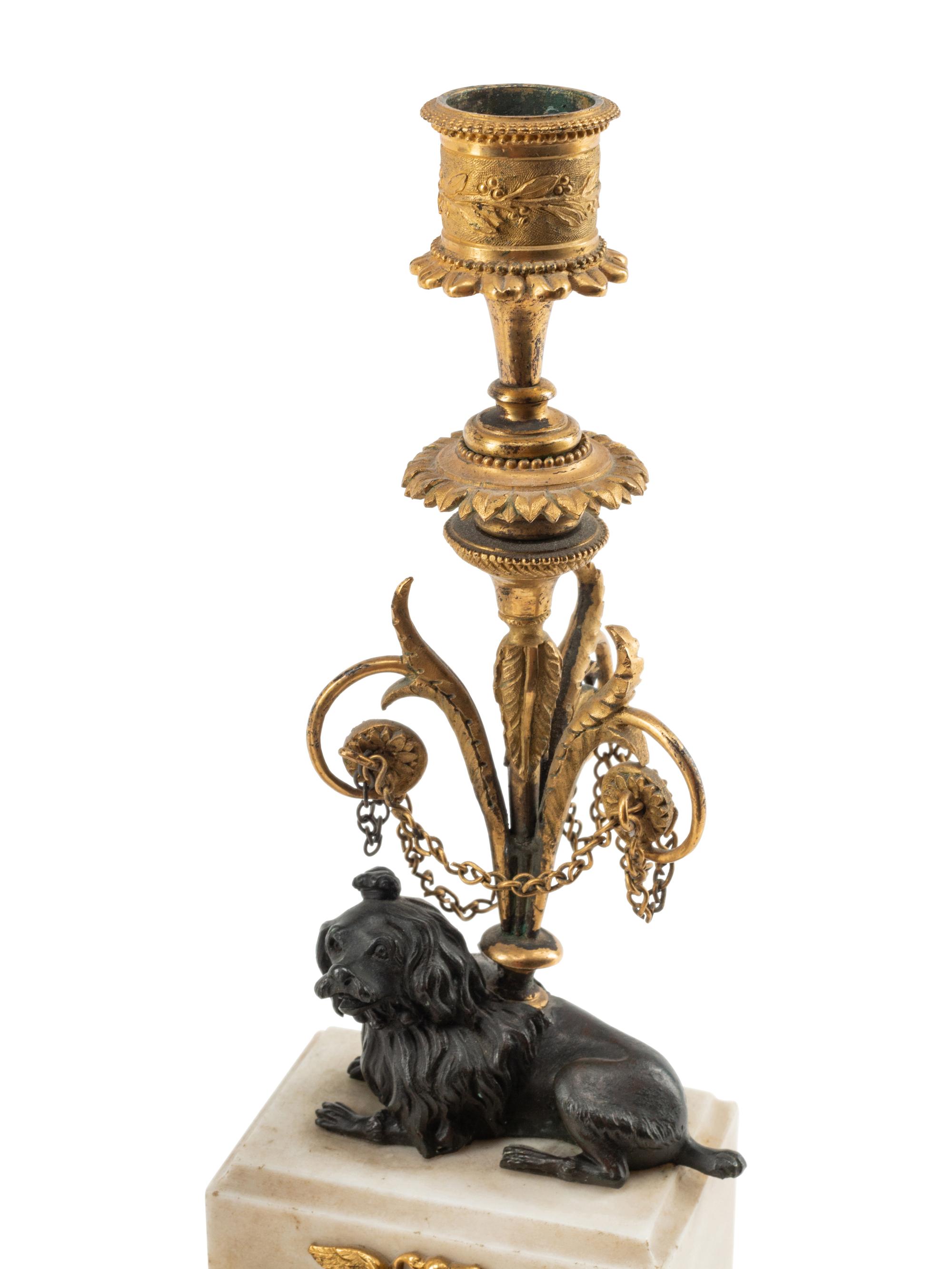 A Pair of Louis Philippe Bronze and Marble Candlesticks