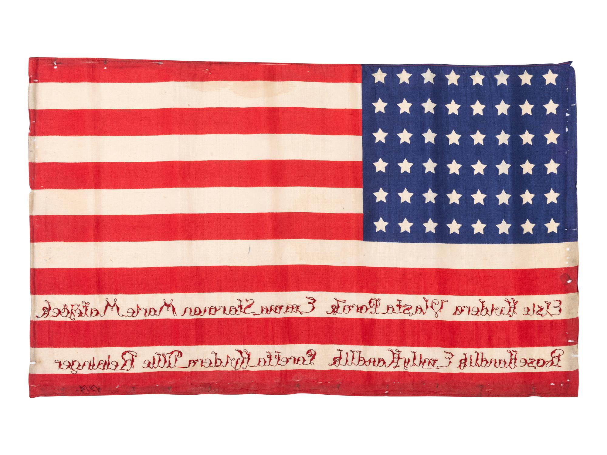 [FLAGS]. 48-star American parade flag identified to eight women, likely honoring their naturalization as US citizens. 1914.