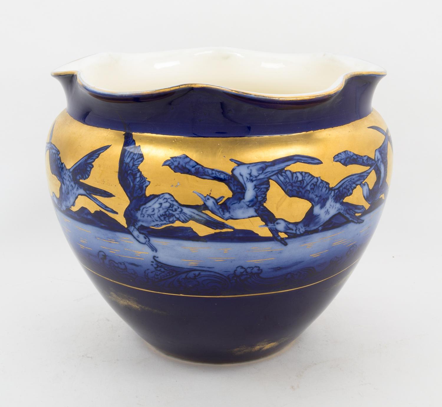 A Continental Porcelain Jardiniere Height 9 inches. — 19TH CENTURY