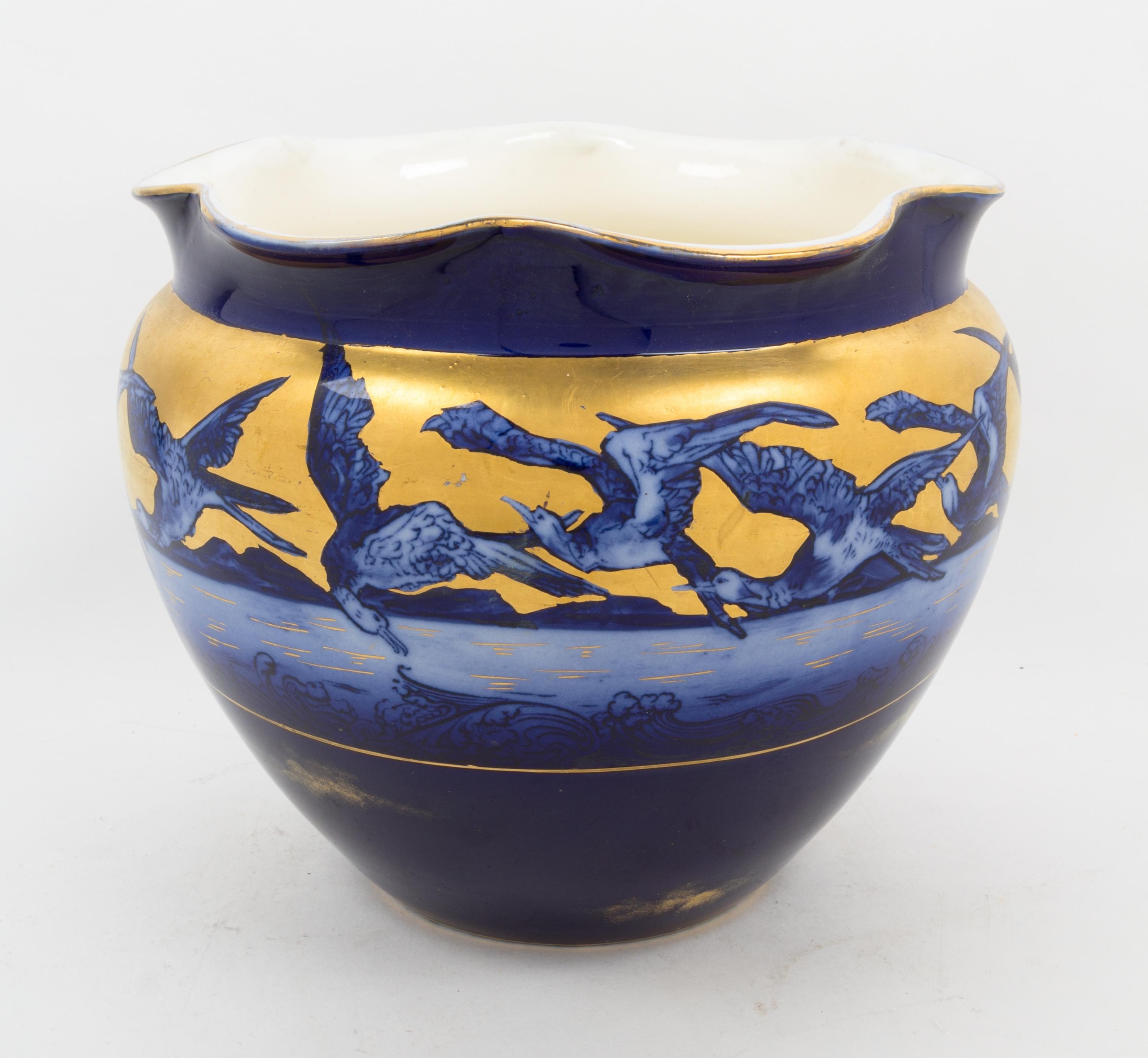 A Continental Porcelain Jardiniere Height 9 inches. — 19TH CENTURY