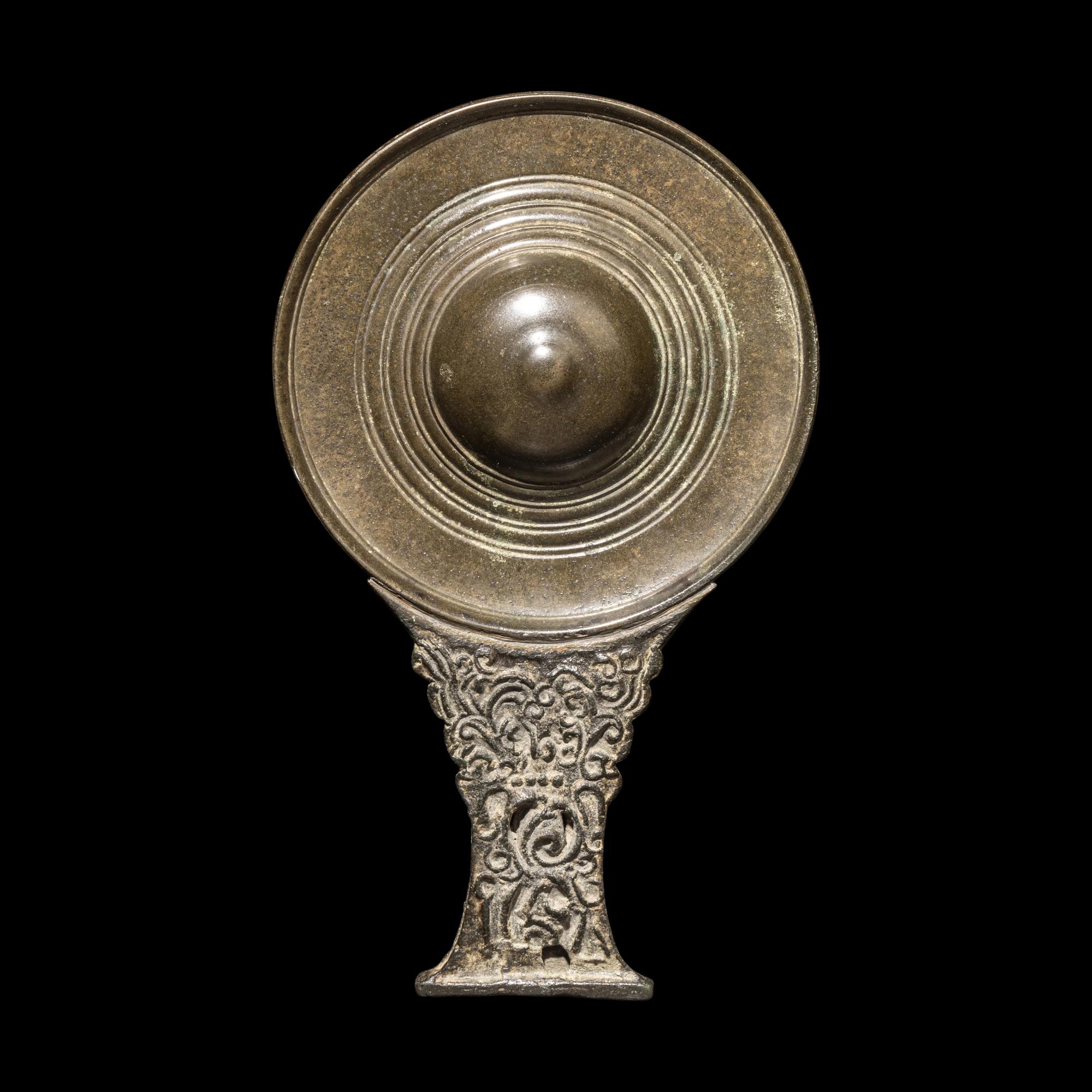 An Indonesia Bronze Mirror, Eastern Java, 10th-11th Century 印尼東爪窪10-11世紀 青銅手把鏡