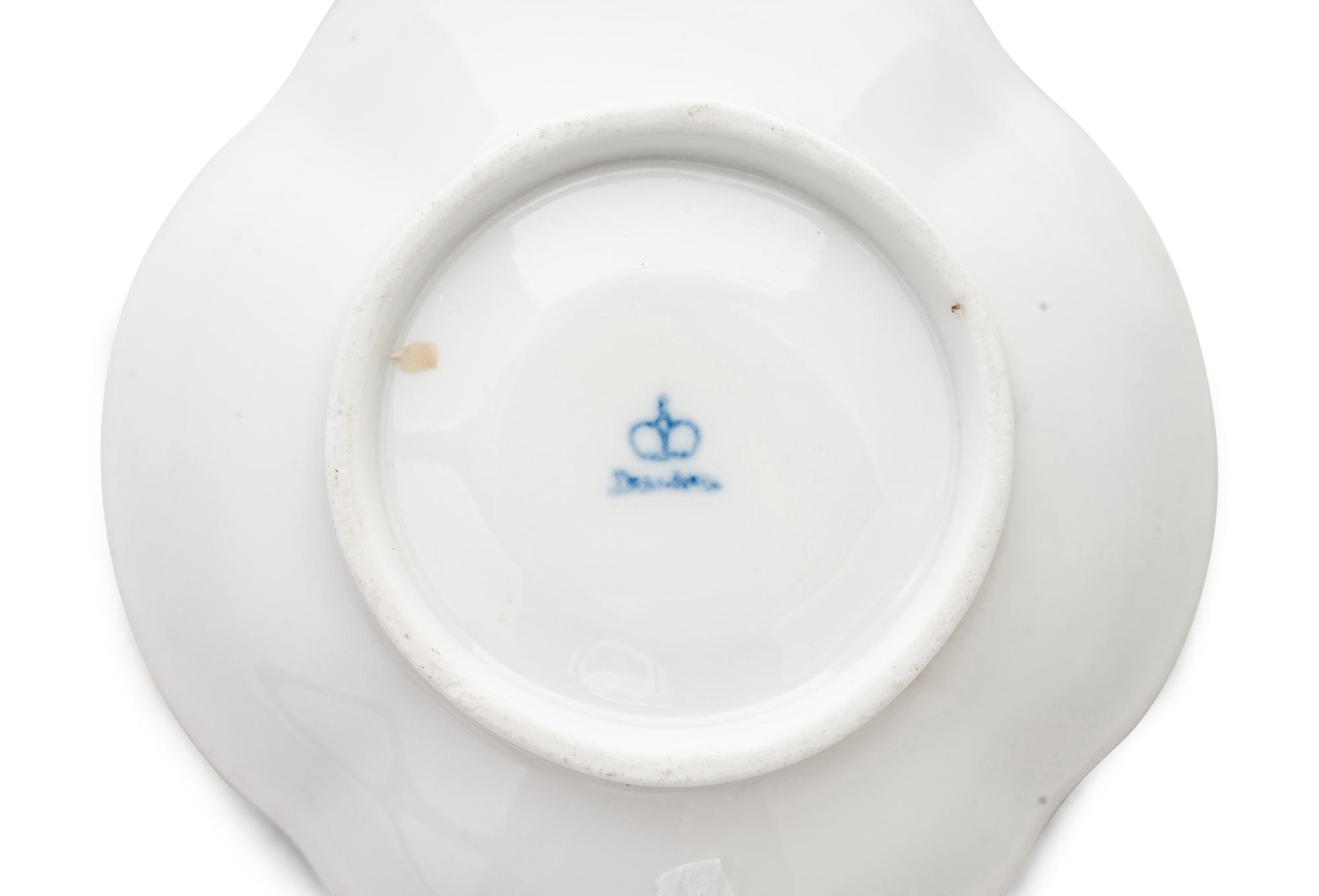 A German Porcelain Covered Cup and Saucer