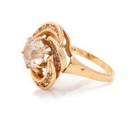 A 14 Karat Yellow Gold and Diamond Ring,