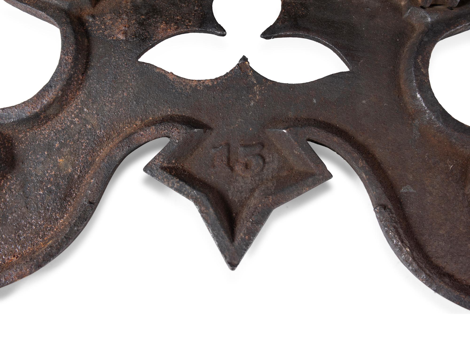 A Cast Iron Lyre Form Music Stand