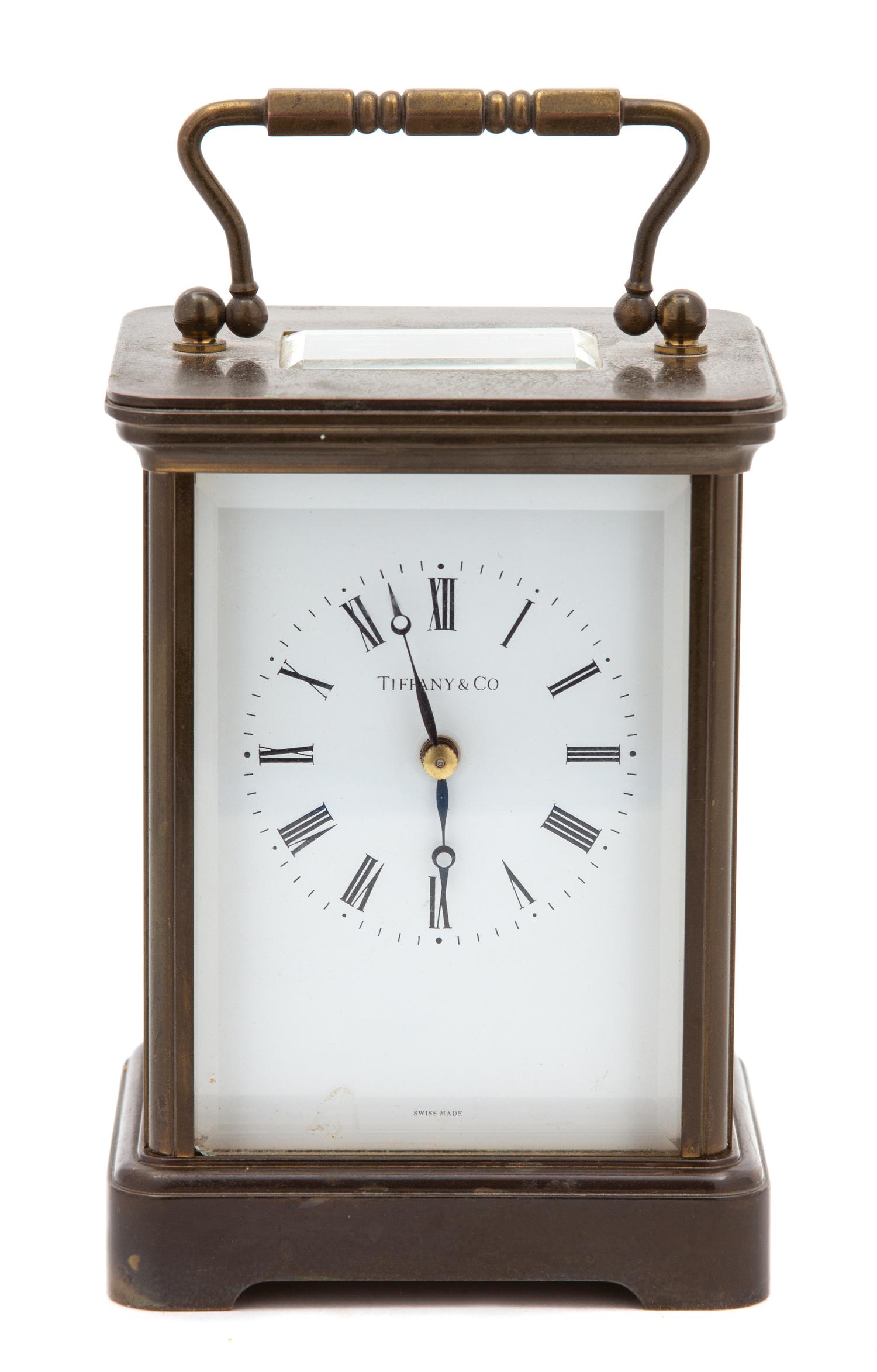 An American Brass Carriage Clock Height 5 1/2 x width 4 x depth 3 1/2 inches. — TIFFANY & CO., NEW YORK, NY, 20TH CENTURY