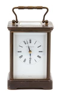 An American Brass Carriage Clock Height 5 1/2 x width 4 x depth 3 1/2 inches. — TIFFANY & CO., NEW YORK, NY, 20TH CENTURY