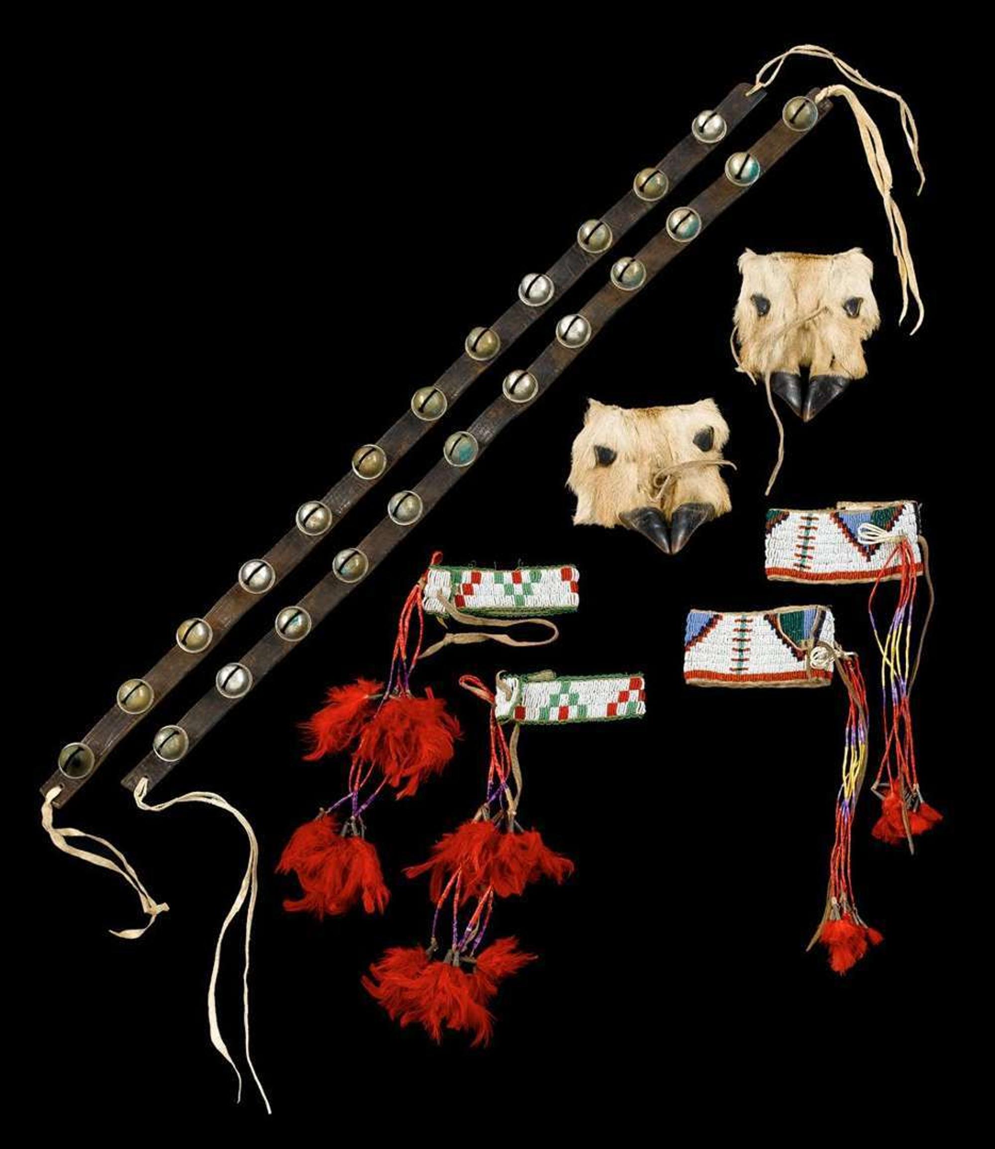 Pair of dance leg bells and two pairs of Sioux beaded and quilled arm bands