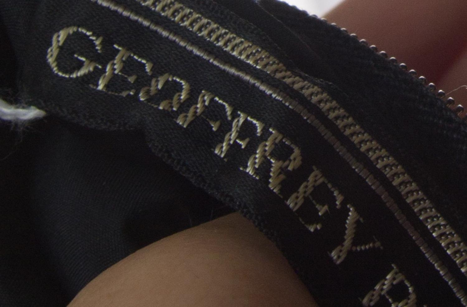 A Geoffrey Beene Black Wool and Rhinestone Gown,