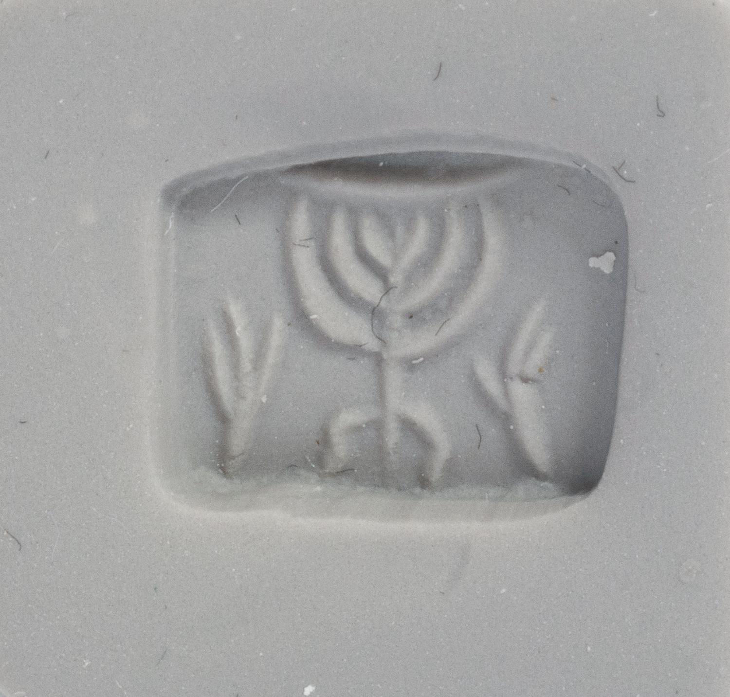 A Holy Land Bronze Ring with a Menorah