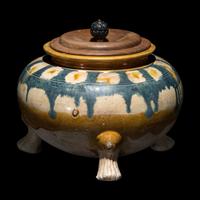 A Tang Style Sancai Glazed Tripod Footed Pottery Jar
