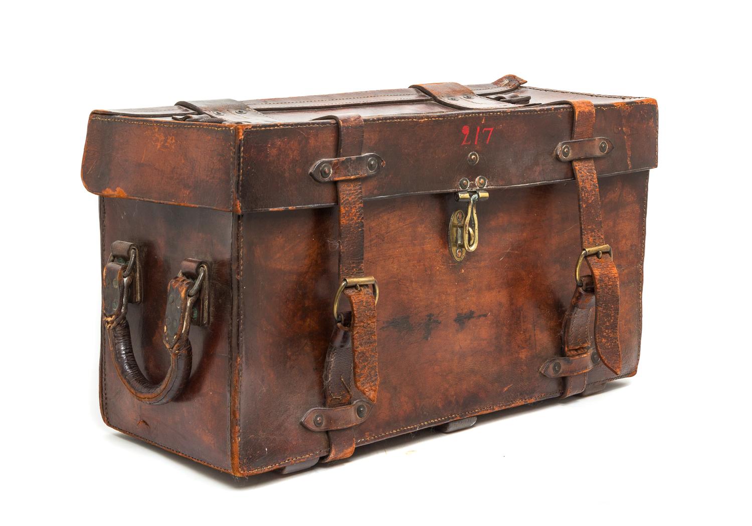 An English Leather Campaign Trunk, Height 16 1/4 x width 29 x depth 11 inches.