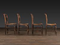 A Set of Four Classical 'Fancy' Stenciled Cane-Seat Side Chairs