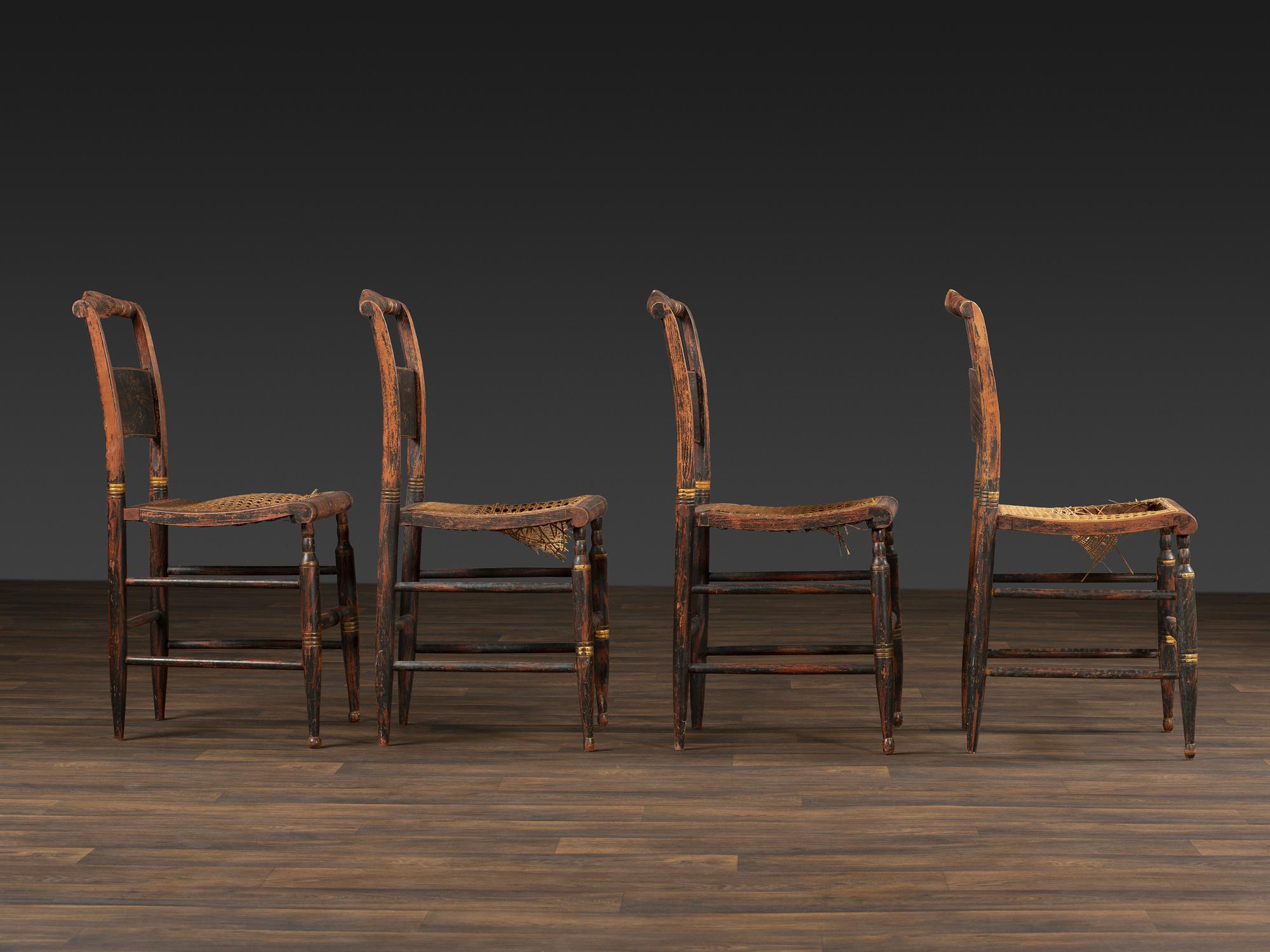 A Set of Four Classical 'Fancy' Stenciled Cane-Seat Side Chairs