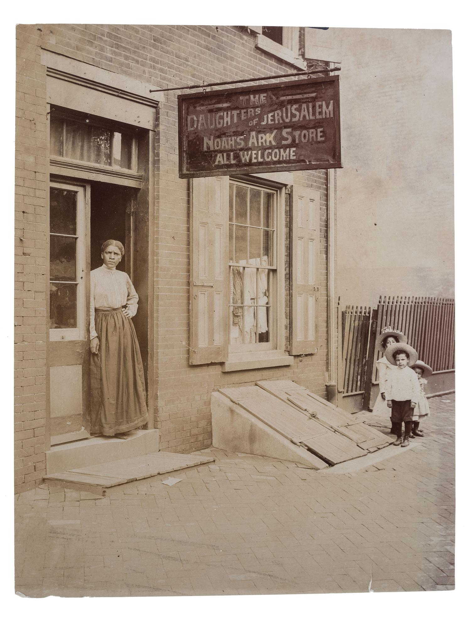 [EARLY PHOTOGRAPHY] -- [RELIGION]. ARCHIBALD, F.R., photographer. Photograph of possible integrated revival meeting showing both African American and white subjects. Ridge Creek, OH, ca 1900.