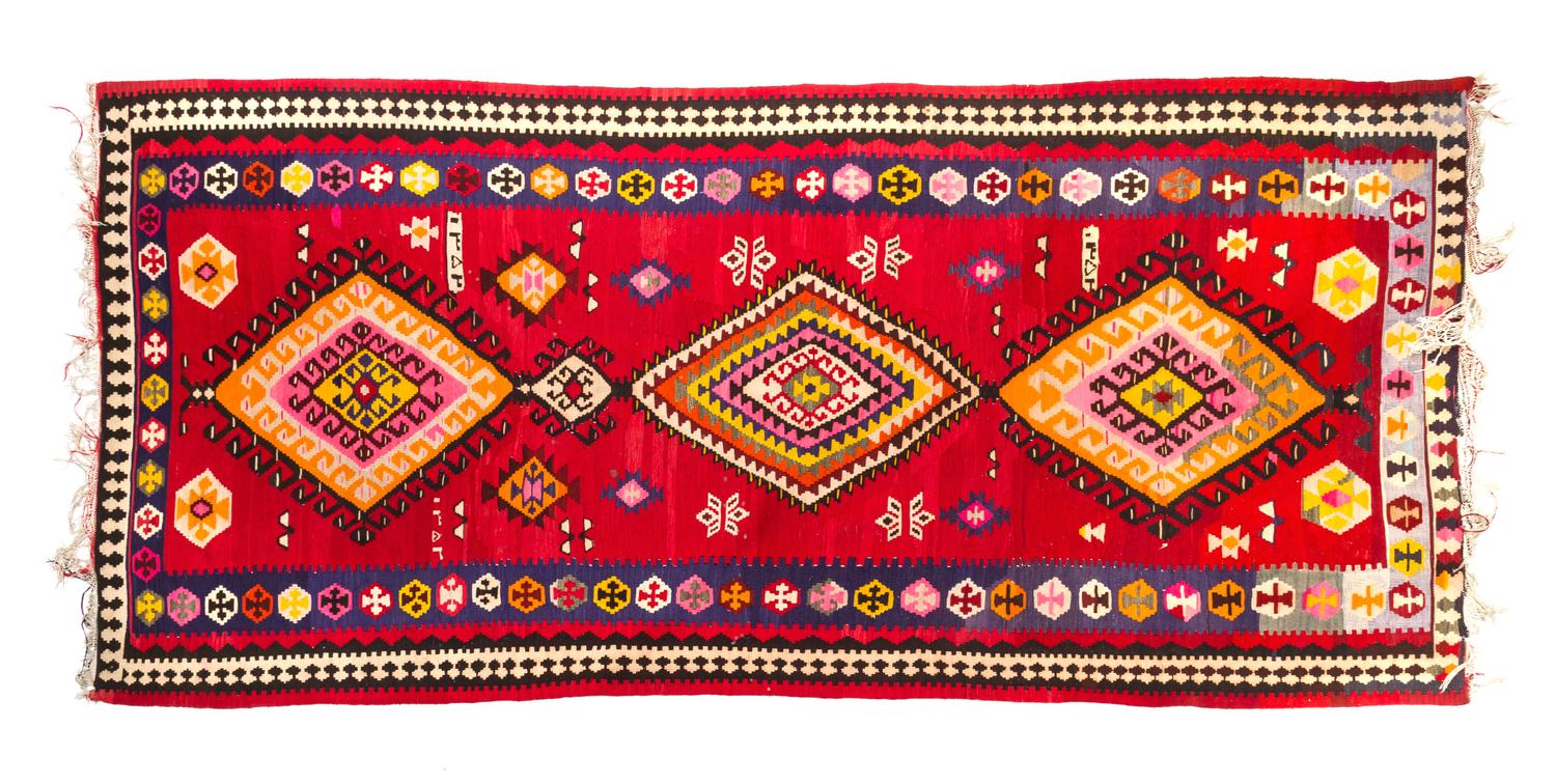 A Kilim Wool Rug 10 feet 3 inches x 5 feet 1 inch.