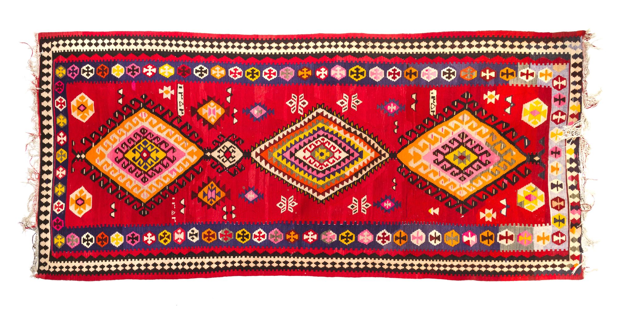 A Kilim Wool Rug 10 feet 3 inches x 5 feet 1 inch.