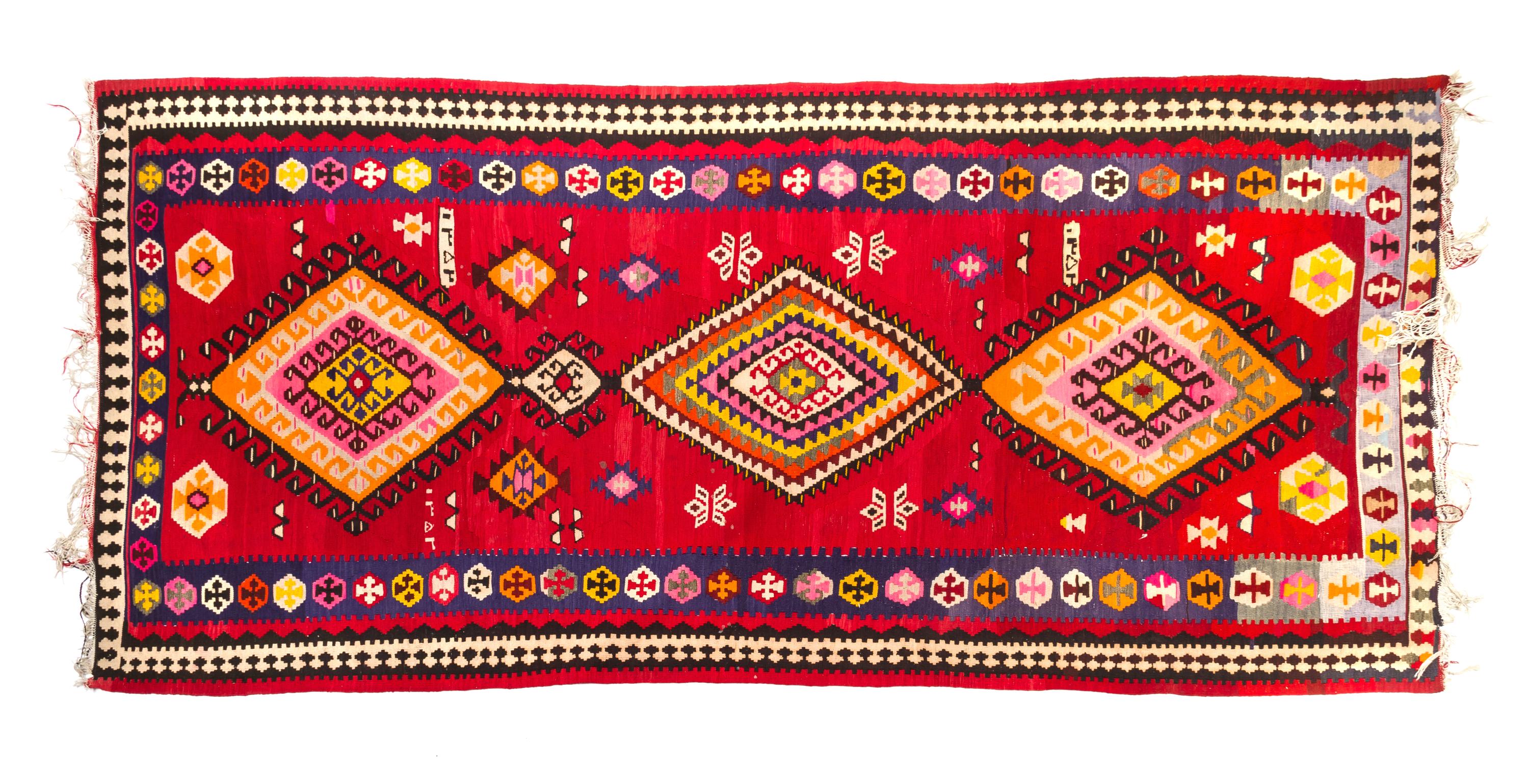 A Kilim Wool Rug 10 feet 3 inches x 5 feet 1 inch.