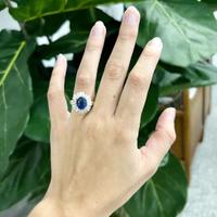 An 18K yellow gold, sapphire, and diamond ring