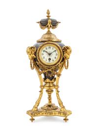 A French Gilt and Patinated Cast Metal Table Clock
