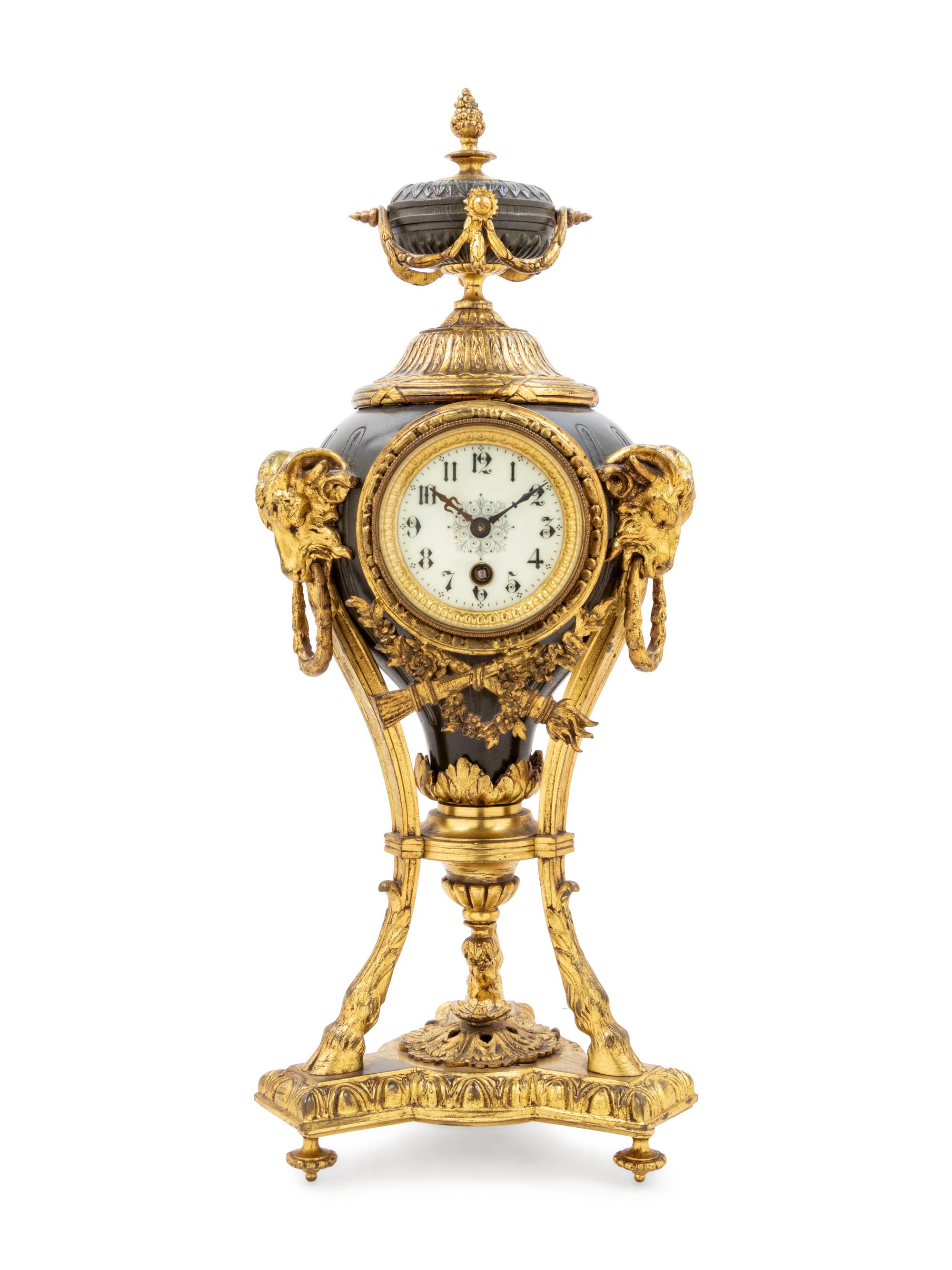 A French Gilt and Patinated Cast Metal Table Clock