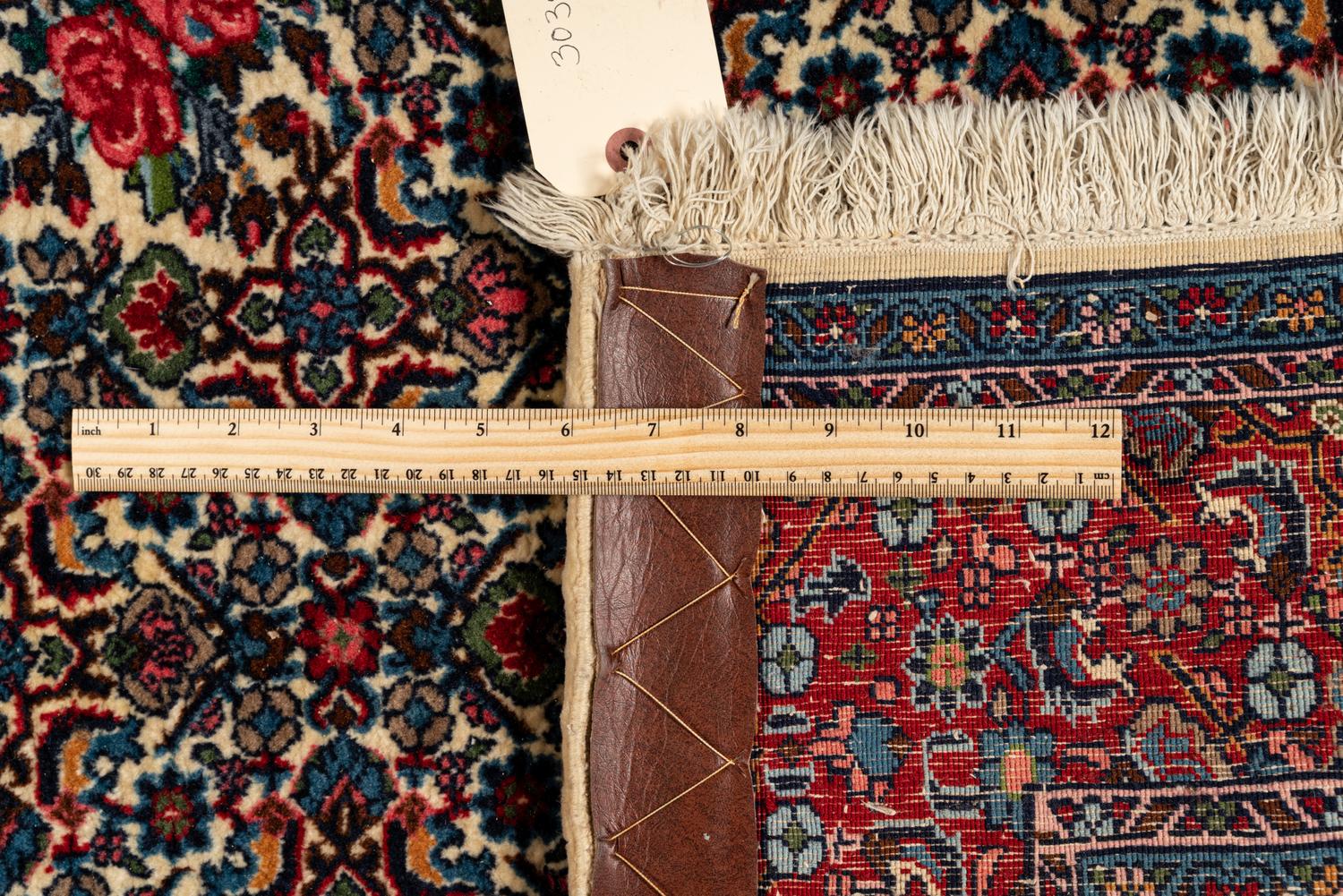A Tabriz Wool Rug