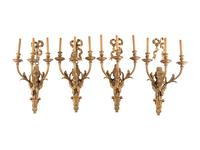 A Set of Eight Louis XVI Style Gilt Bronze Three-Light Sconces