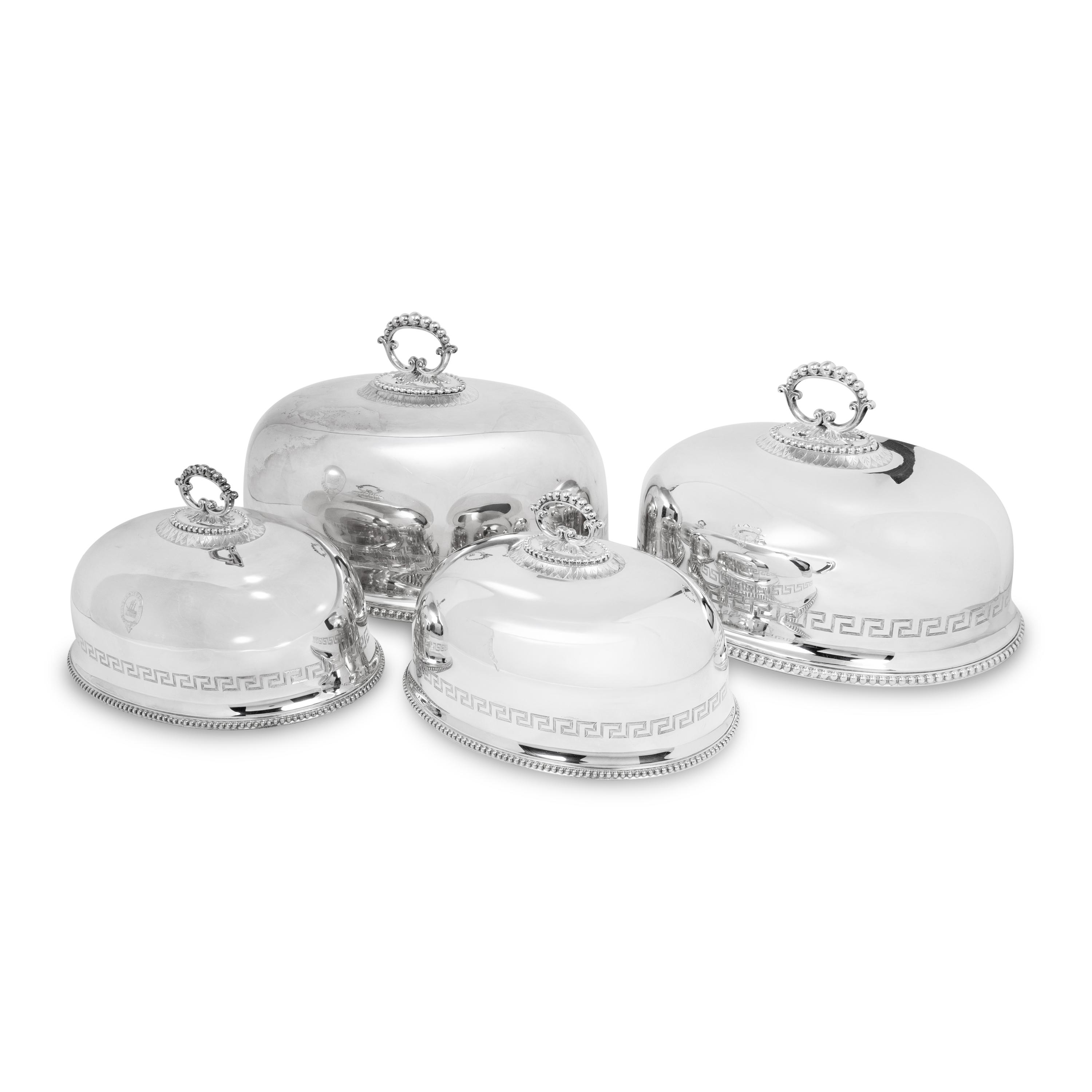 A Set of Four English Silver-Plate Cloches
