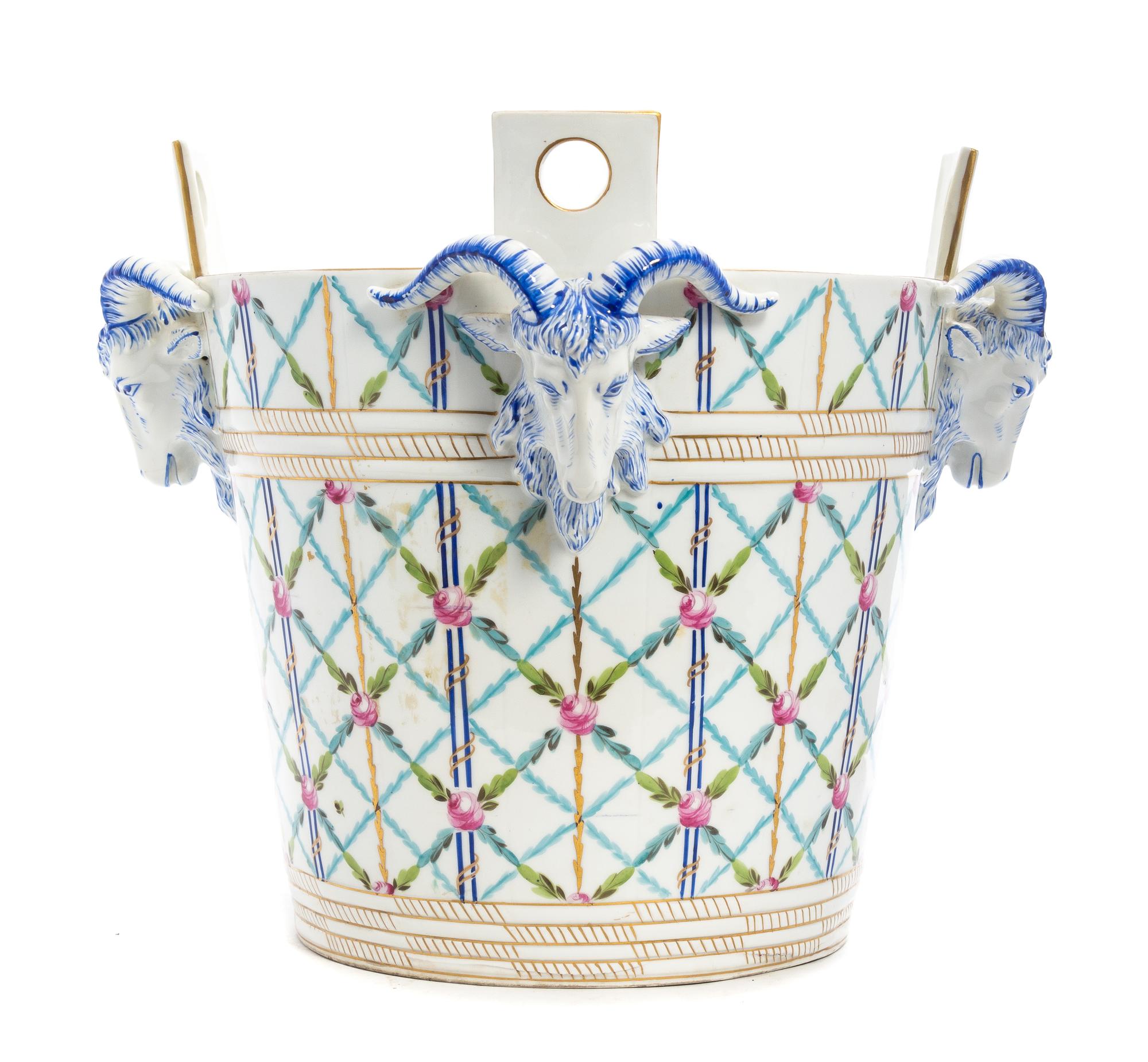A French Porcelain Jardiniere Height 12 1/2 inches.