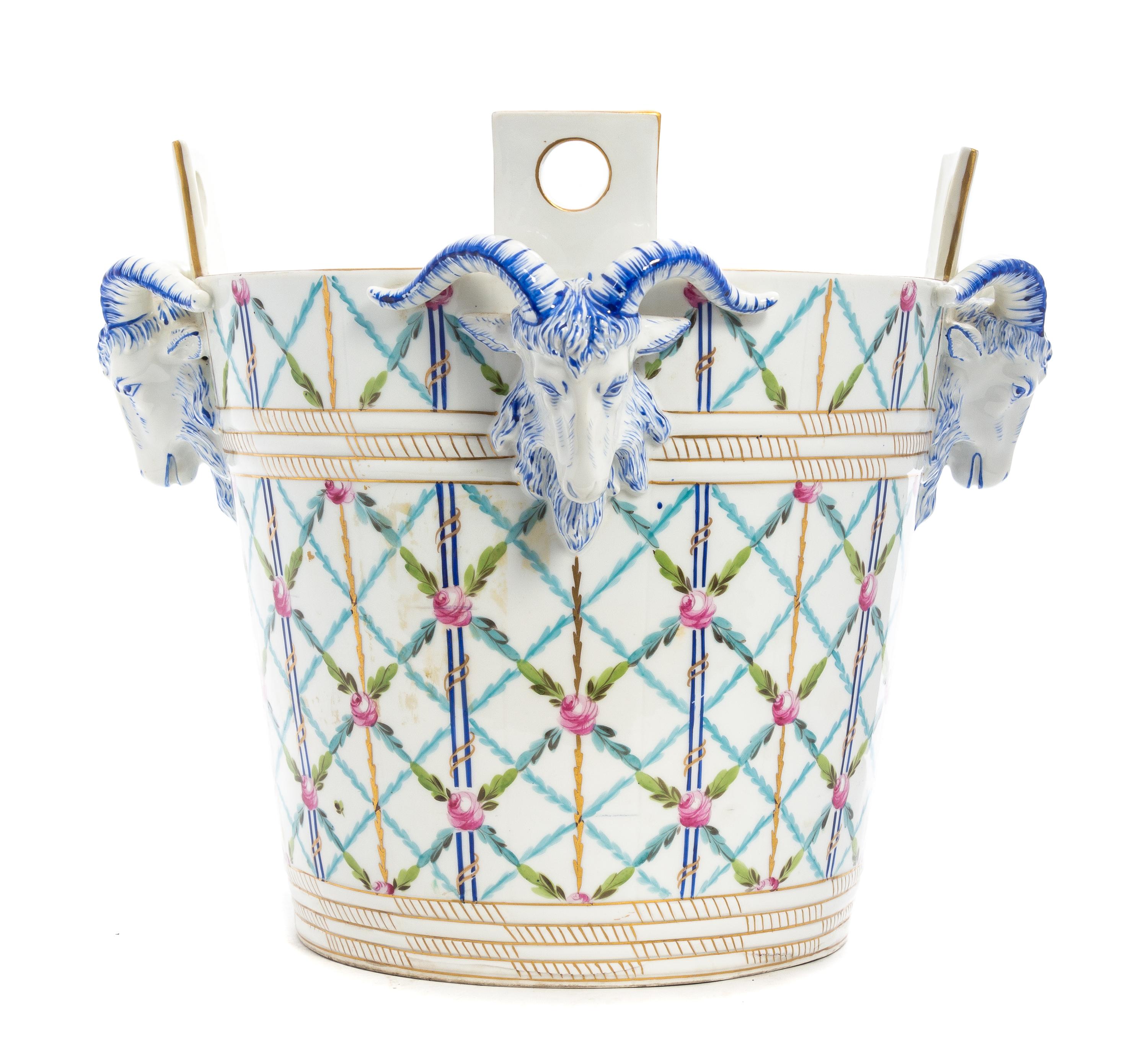 A French Porcelain Jardiniere Height 12 1/2 inches.