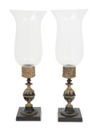 A Pair of Continental Metal Candlesticks