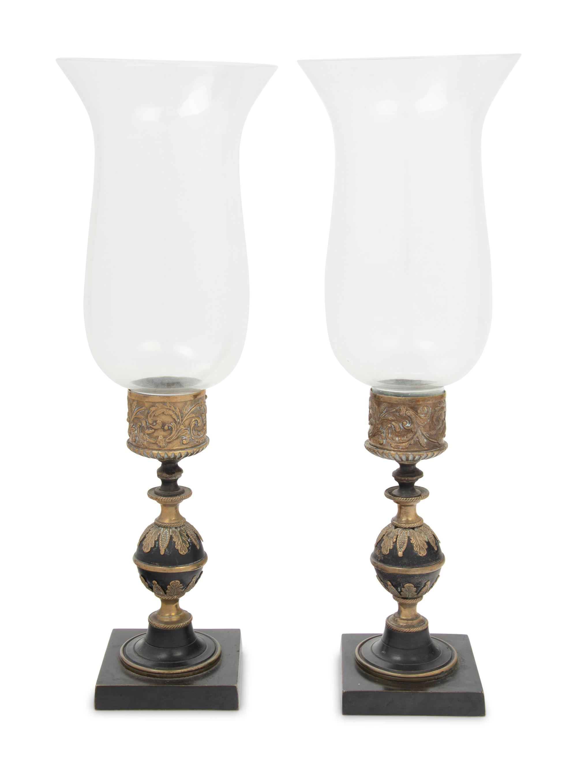 A Pair of Continental Metal Candlesticks