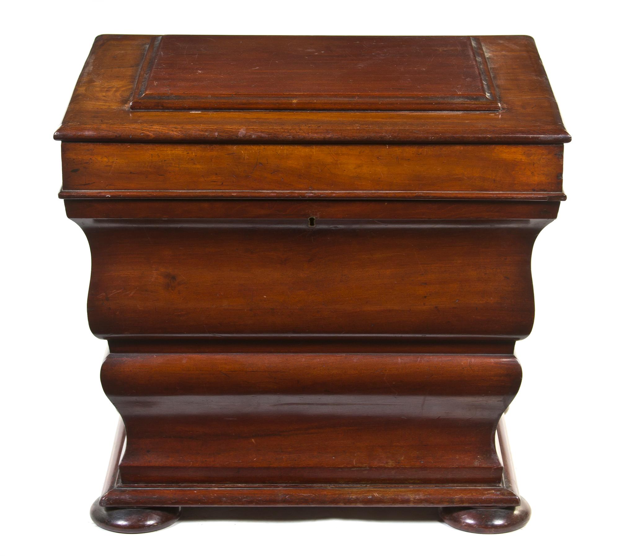 A Georgian Style Mahogany Cellarette, Height 22 1/4 x width 26 x depth 22 3/4 inches.