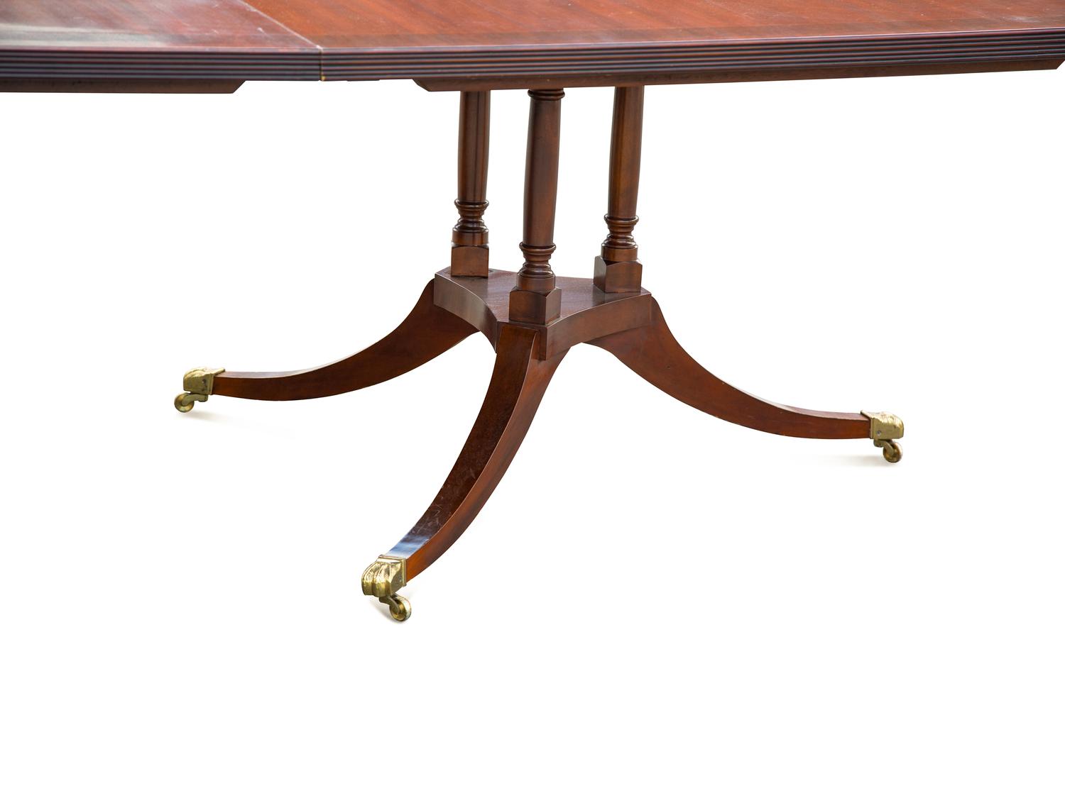 A Regency Style Walnut Dining Table