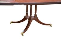 A Regency Style Walnut Dining Table