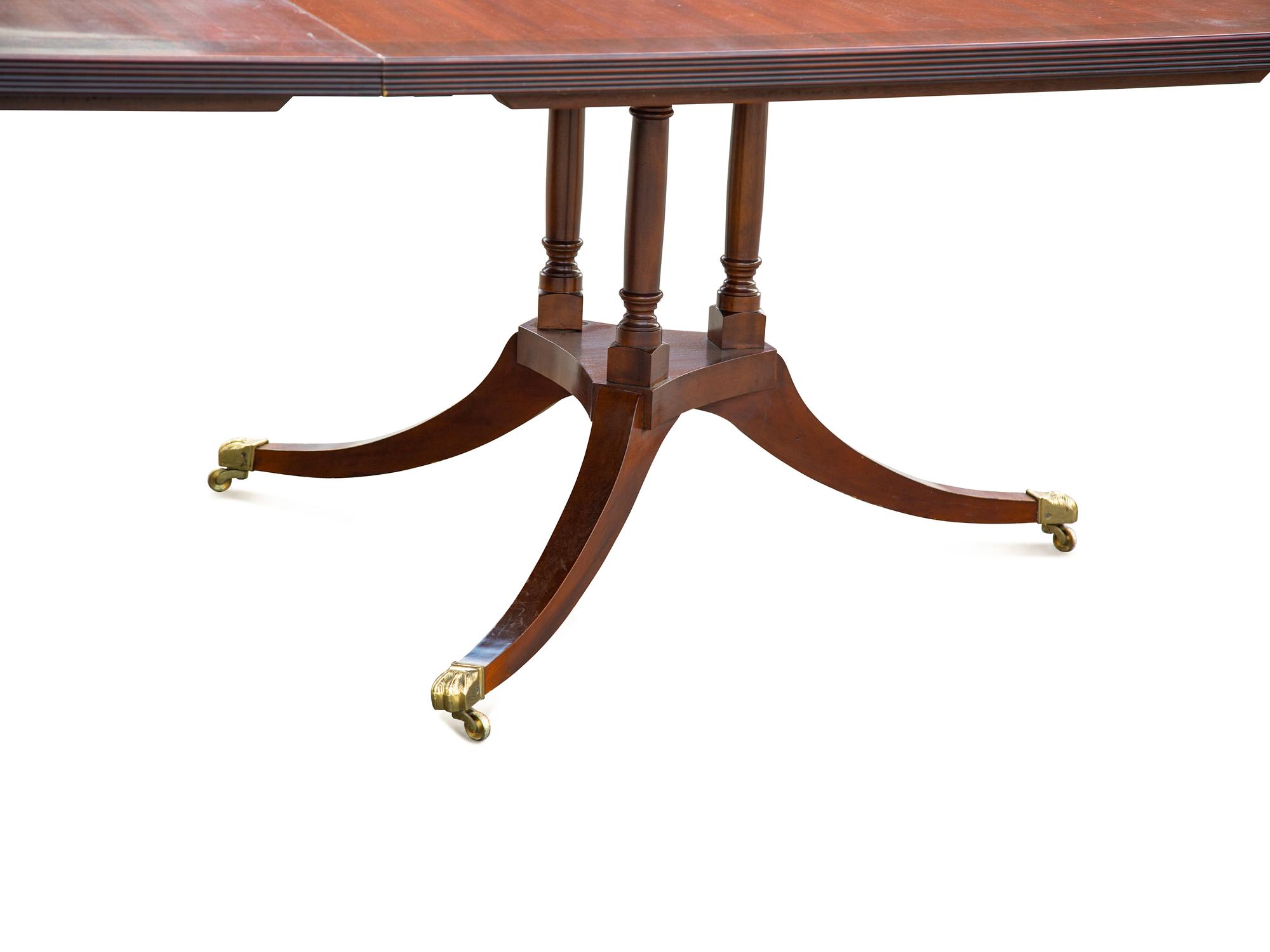 A Regency Style Walnut Dining Table