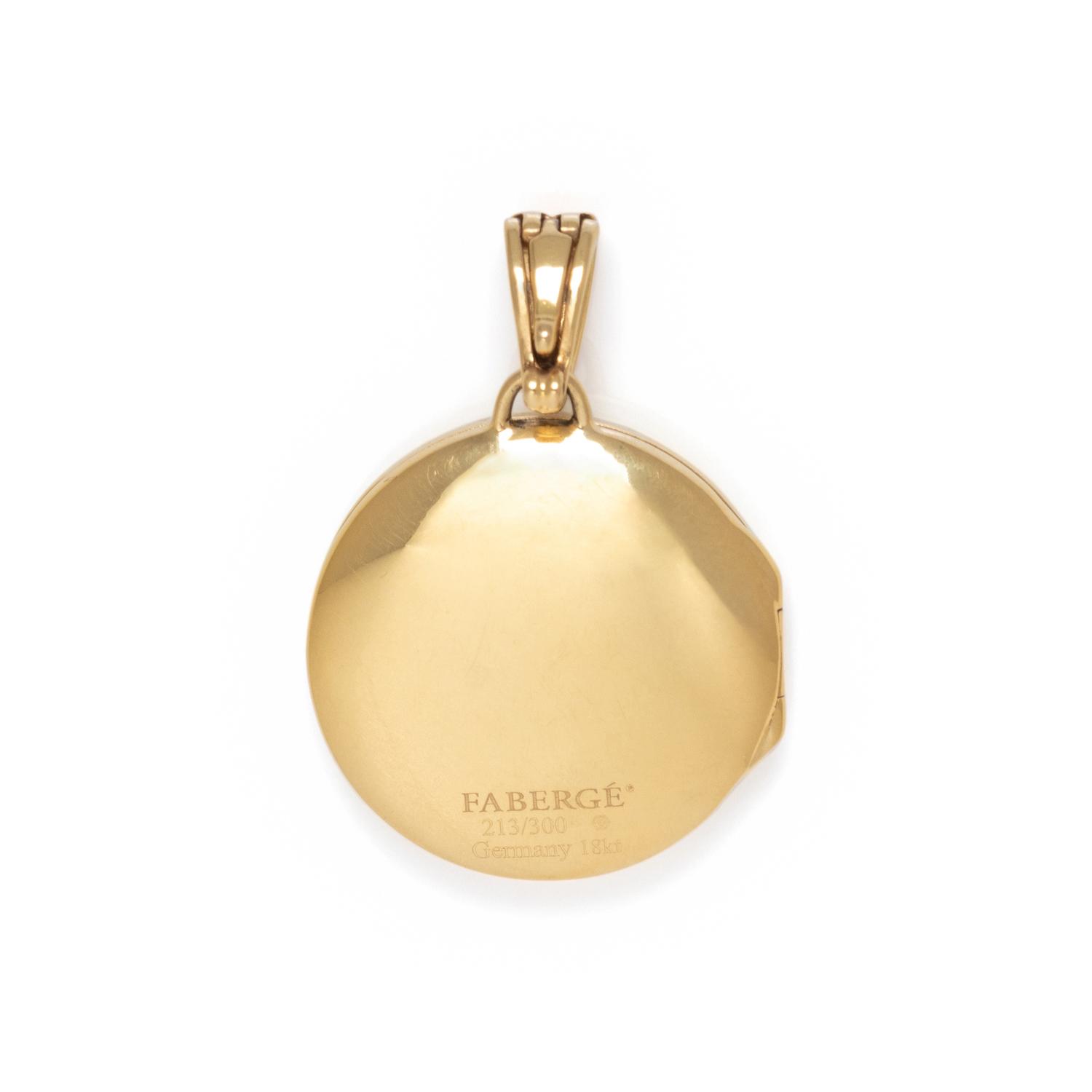 FABERGÉ, DIAMOND, RUBY AND ENAMEL LOCKET