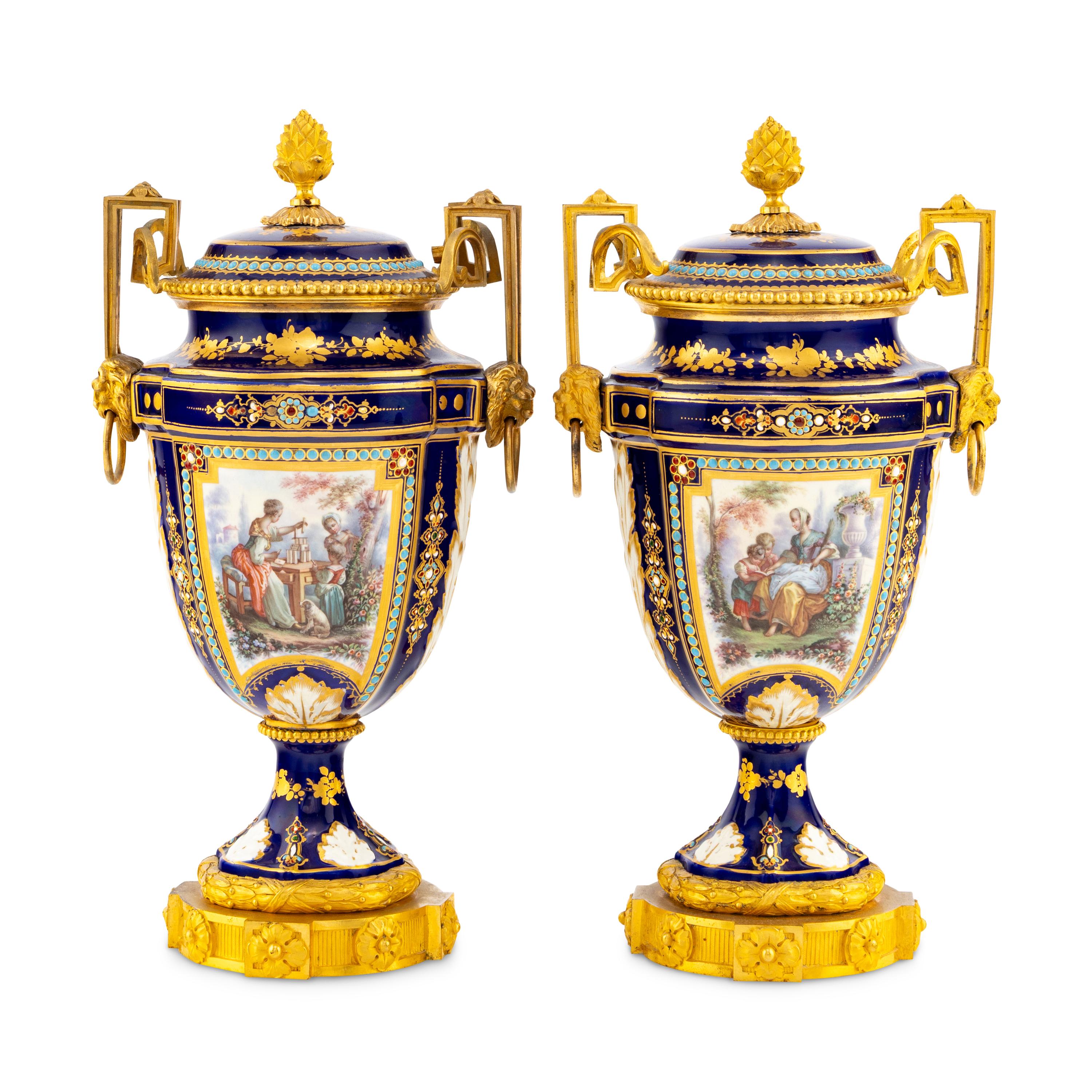 A Pair of Sèvres Style Porcelain, Enameled and Gilt Bronze Mounted Urns