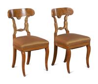 A Pair of Biedermeier Parcel-Gilt Birch Side Chairs