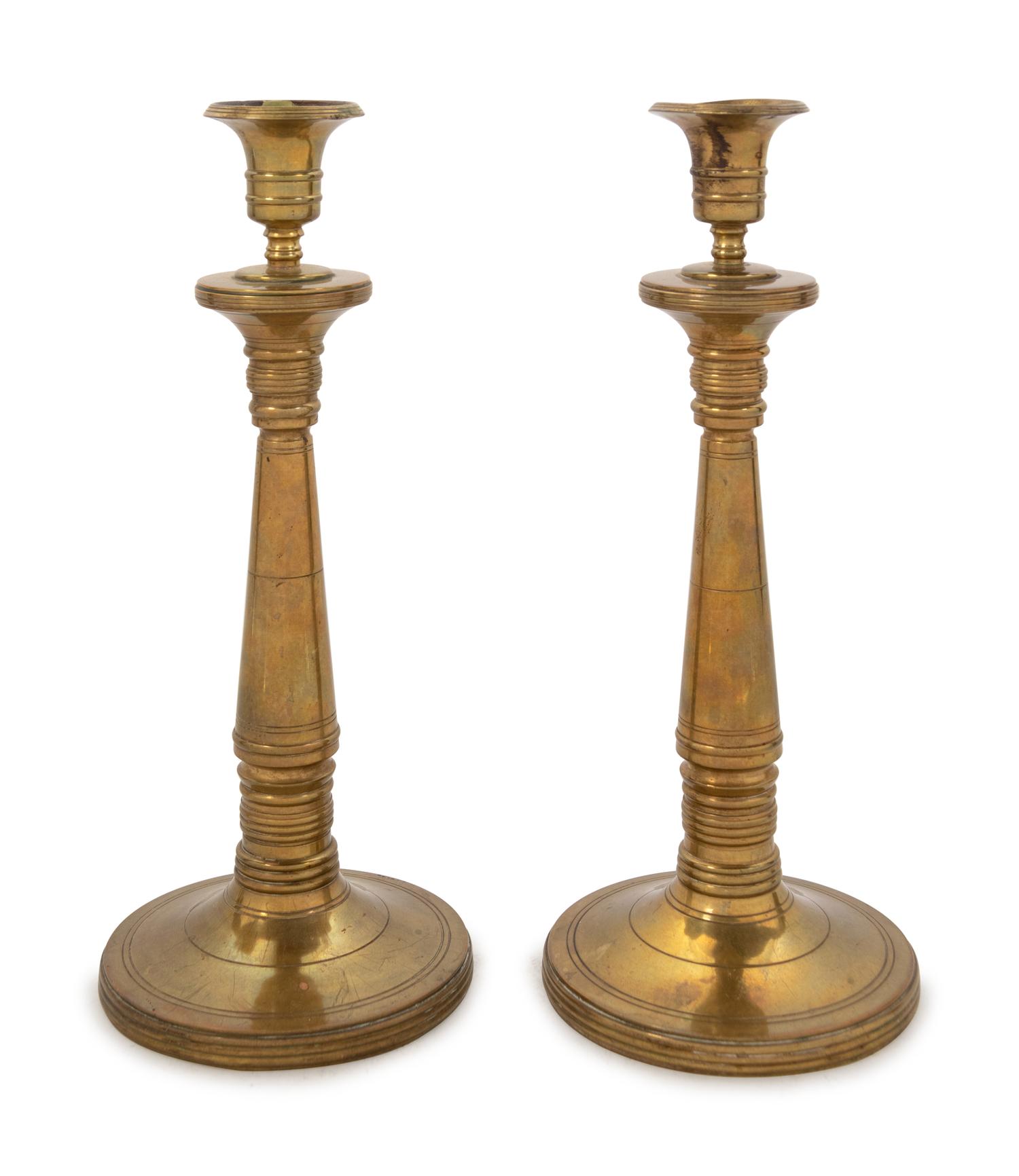 A Pair of Brass Candlesticks