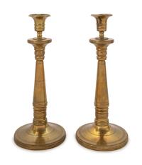 A Pair of Brass Candlesticks