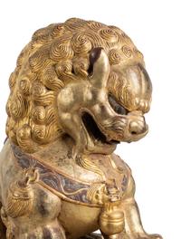 A Pair of Large Chinese Giltwood and Composition Buddhistic Lions