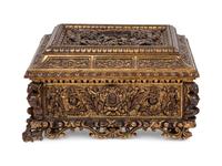 An Italian Parcel Gilt and Carved Walnut Orpheus and Eurydice Casket