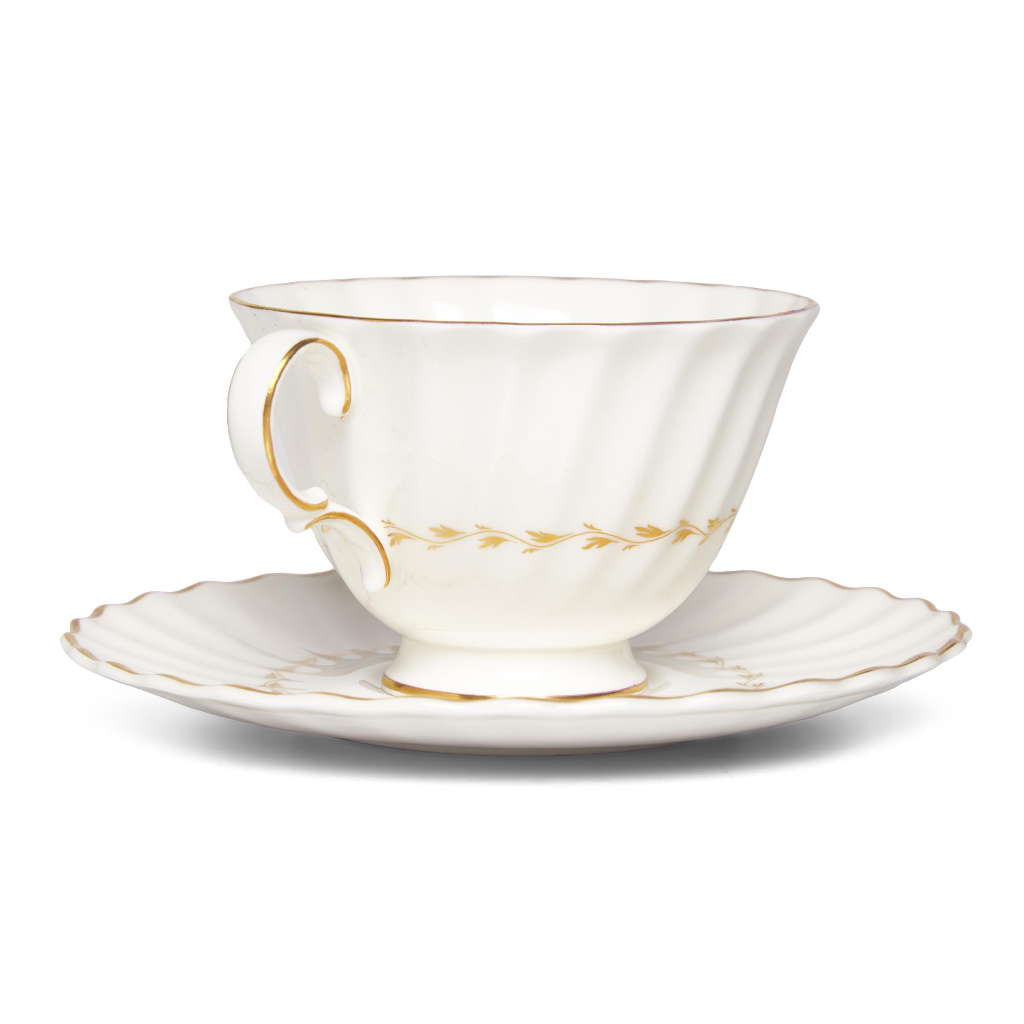 A Royal Doulton Gilt-Decorated Porcelain Tea Service