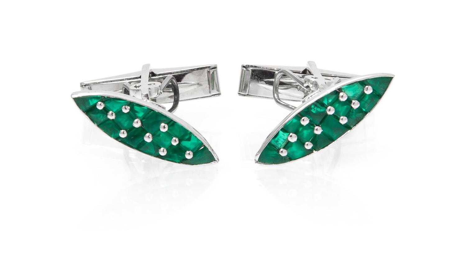 A Pair of White Gold and Emerald Cufflinks, 6.40 dwts.