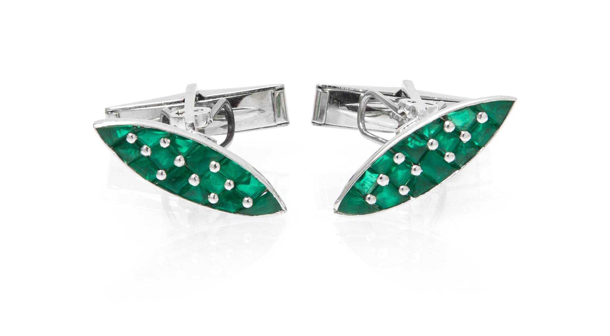 A Pair of White Gold and Emerald Cufflinks, 6.40 dwts.