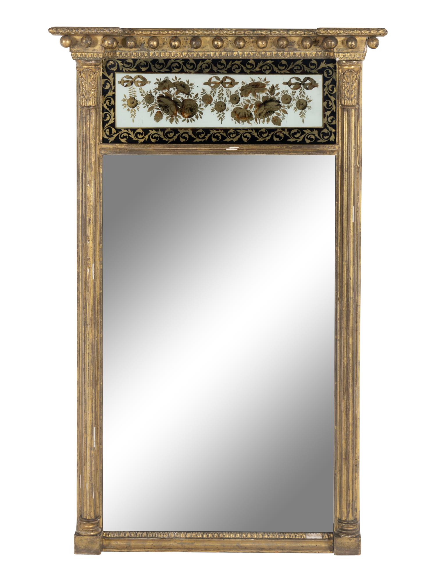 A Regency Giltwood and Églomisé Mirror