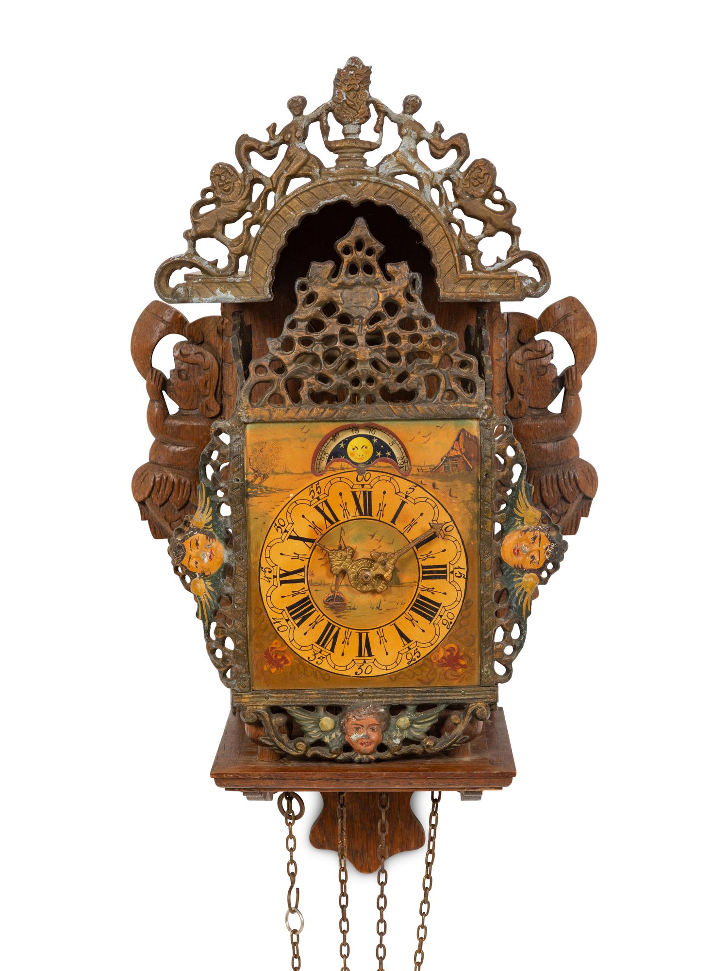 A Dutch Carved and Painted Wall Clock