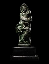 A Roman Bronze Figure of an Actor