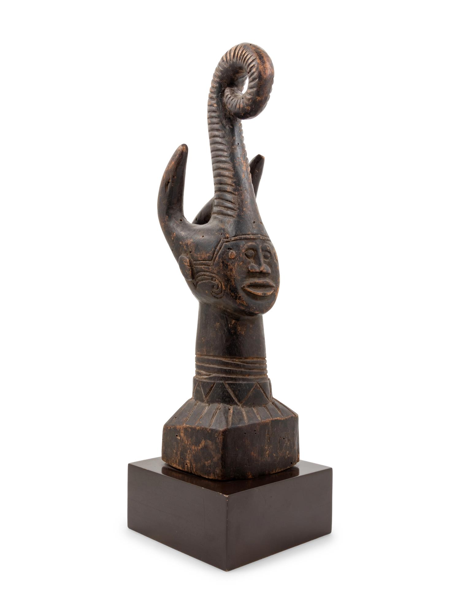 An Igbo Style Carved Wood Sculpture